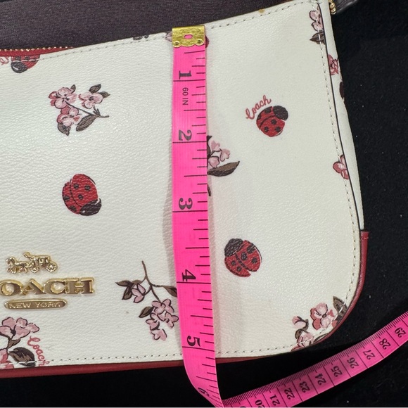 Coach Red and White Crossbody Bag with Floral and Ladybug Design - Picture 15 of 16